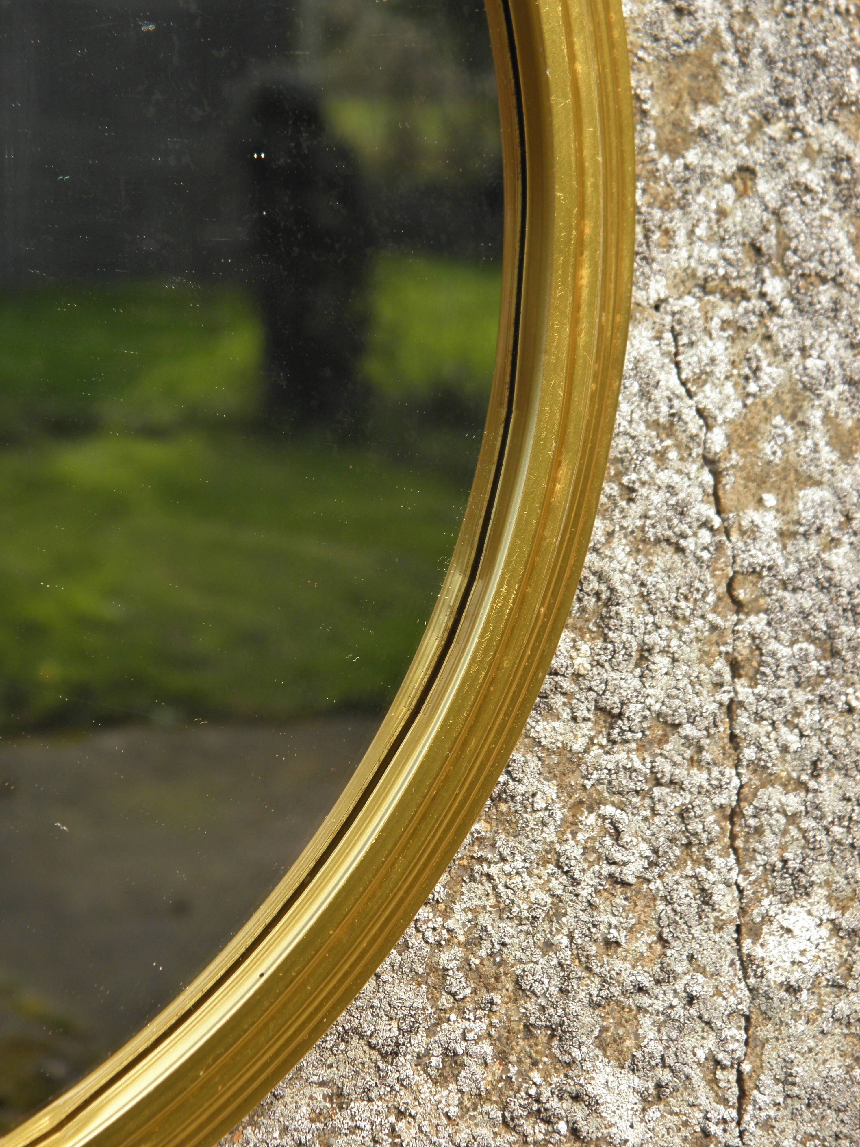 Round mirror with gold frame 31 cm