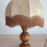 Table lamp in turned wood and umbrella-style leather lampshade