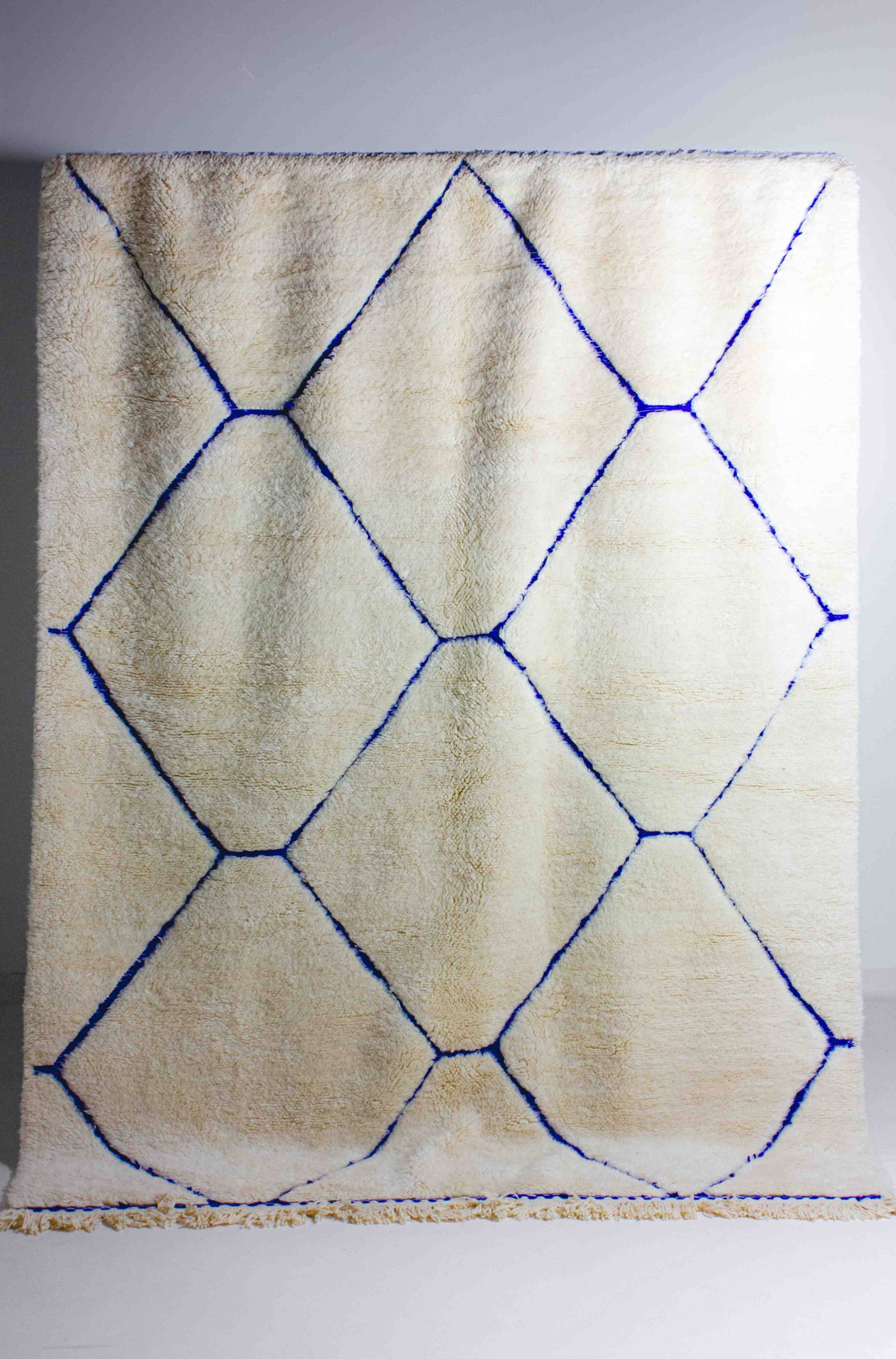 Vintage berber rug in ivory and blue wool