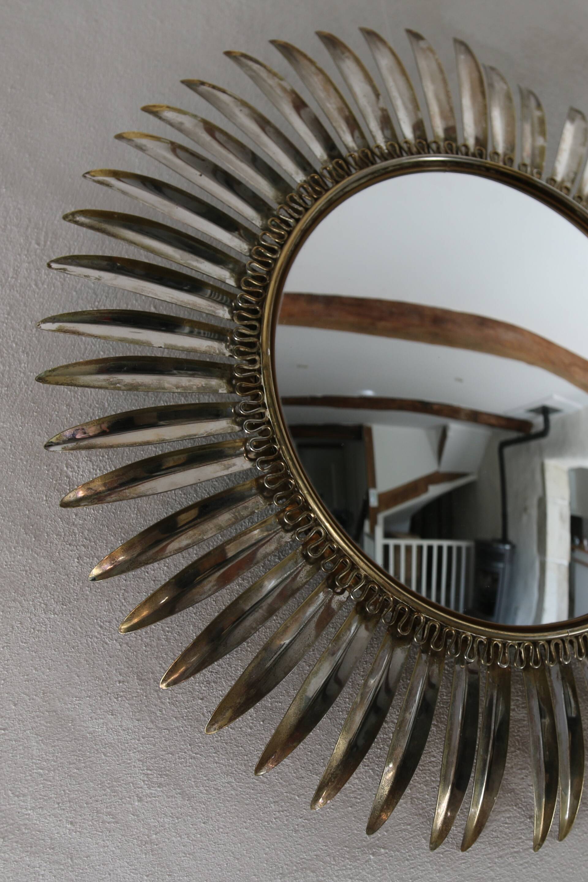 Deknudt convex sun mirror in metal, 70s
