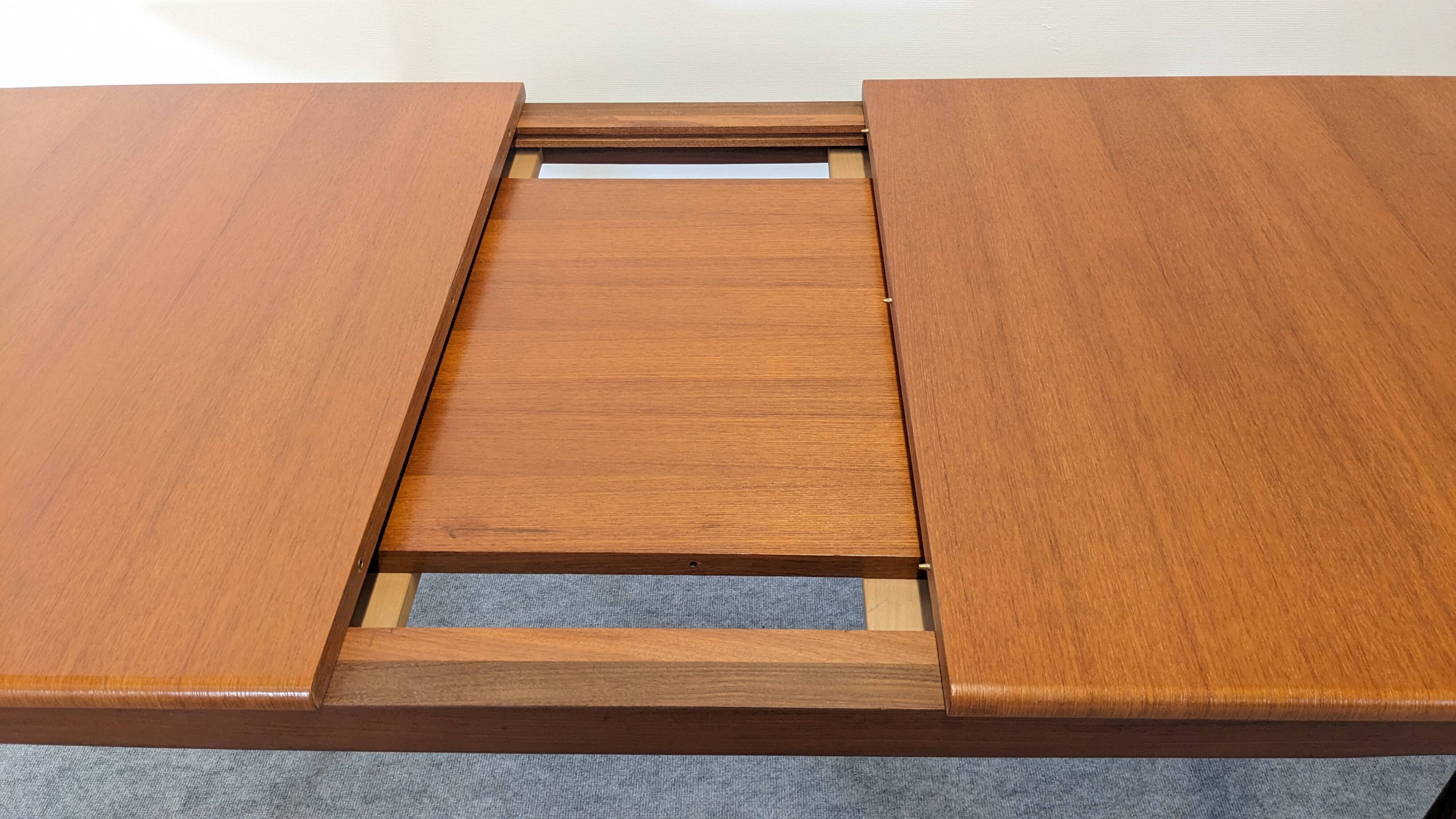 Extendable Scandinavian teak dining table, circa 1960