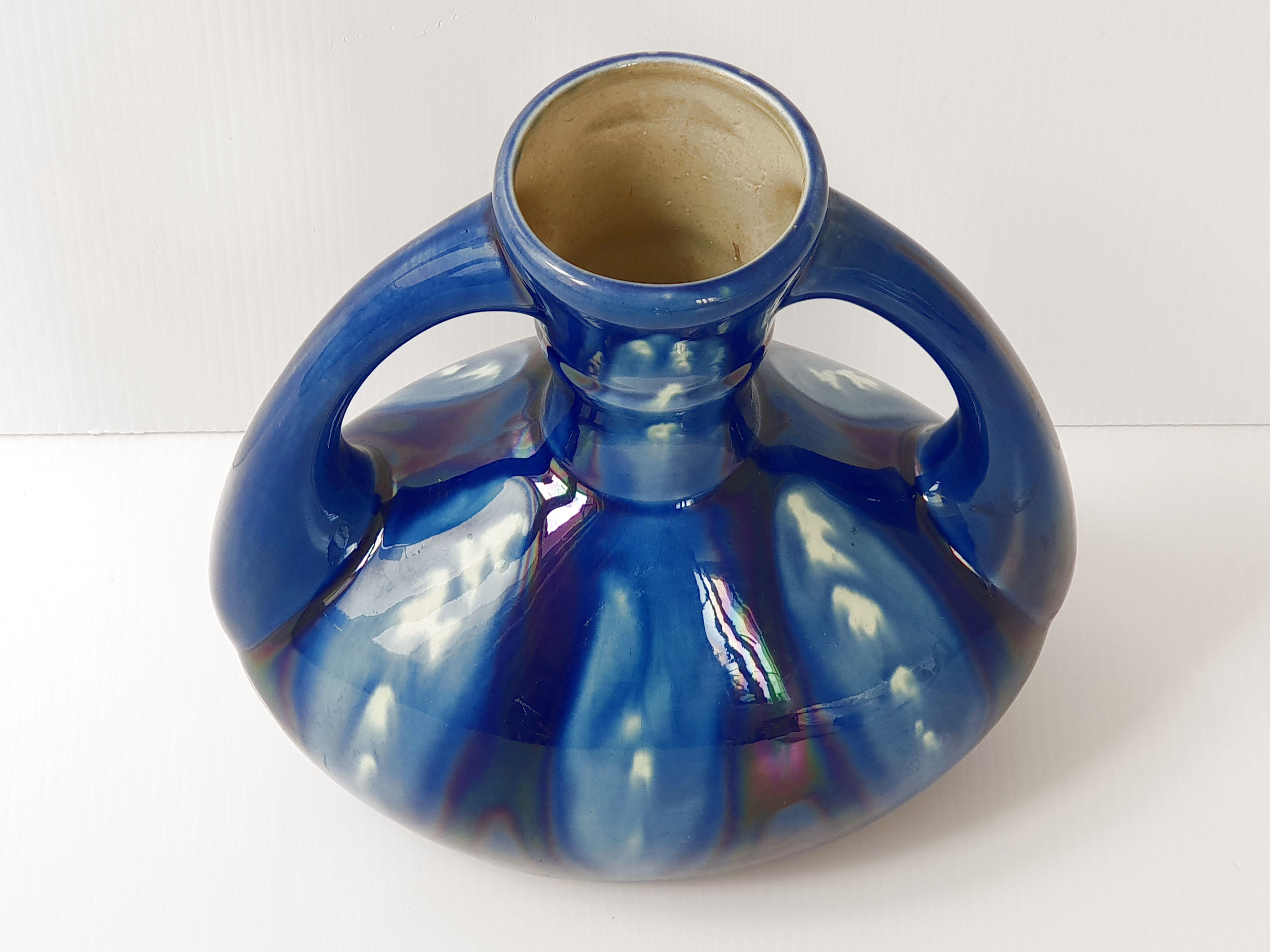 Vintage vase in flamed sandstone