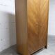 1950s Mid-Century Modern oak armoire with two doors and two drawers.