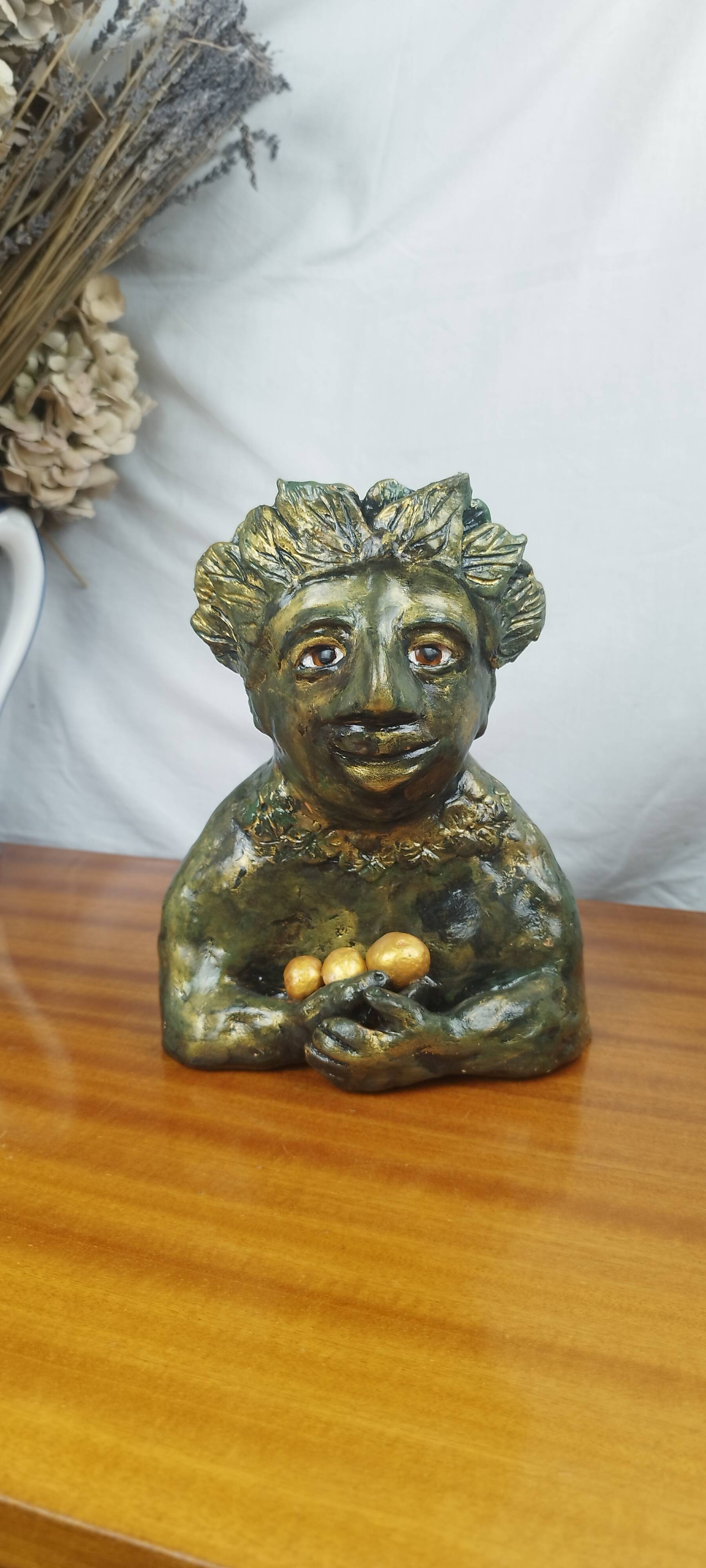 Clay sculpture of mother nature holding eggs, vintage modern figurative art
