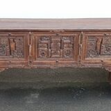 Old wooden console with chains