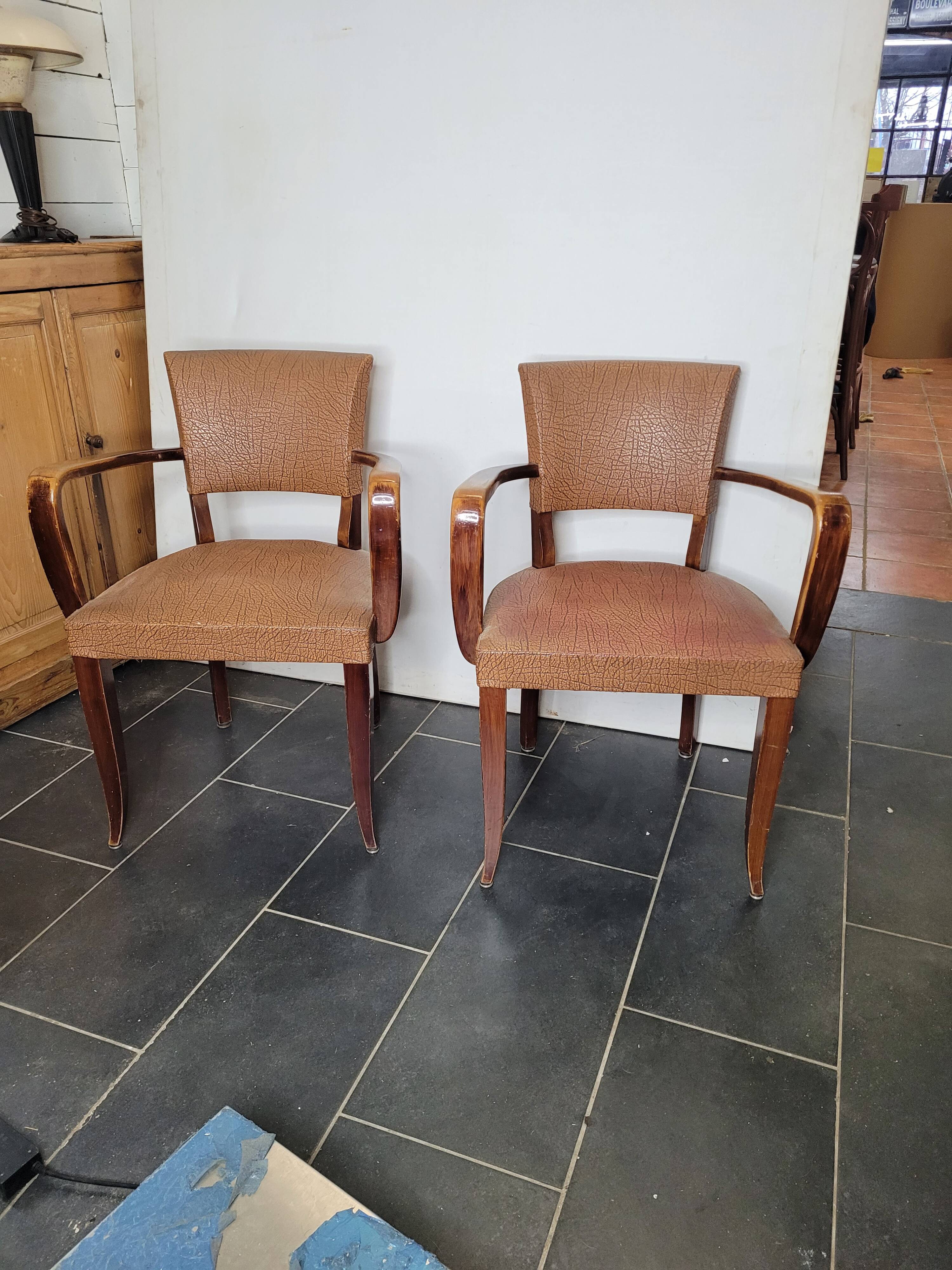 Pair of skai bridge armchairs