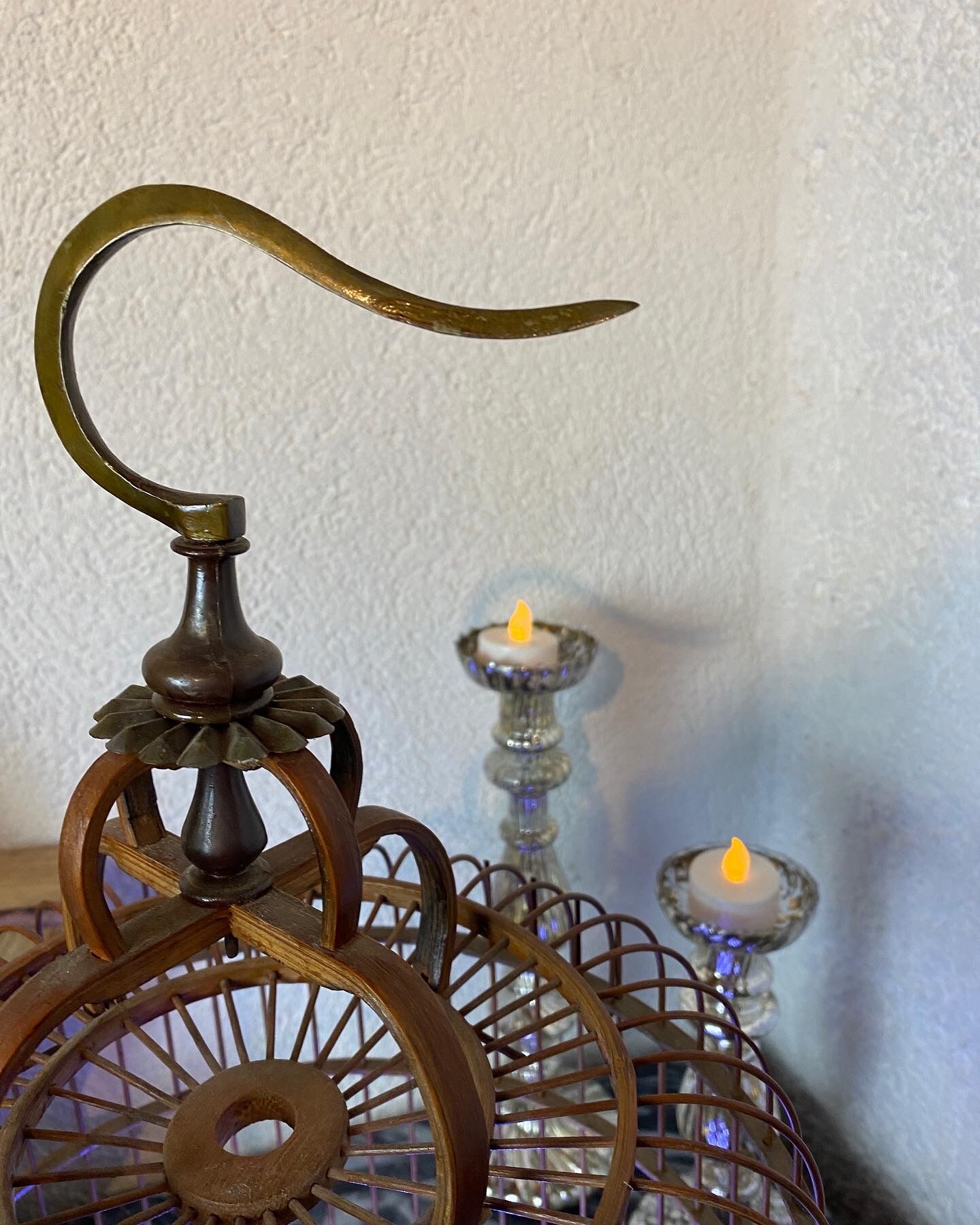 Old bird cage made of bamboo and wood