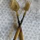 Horn and metal salad servers from the 1920s