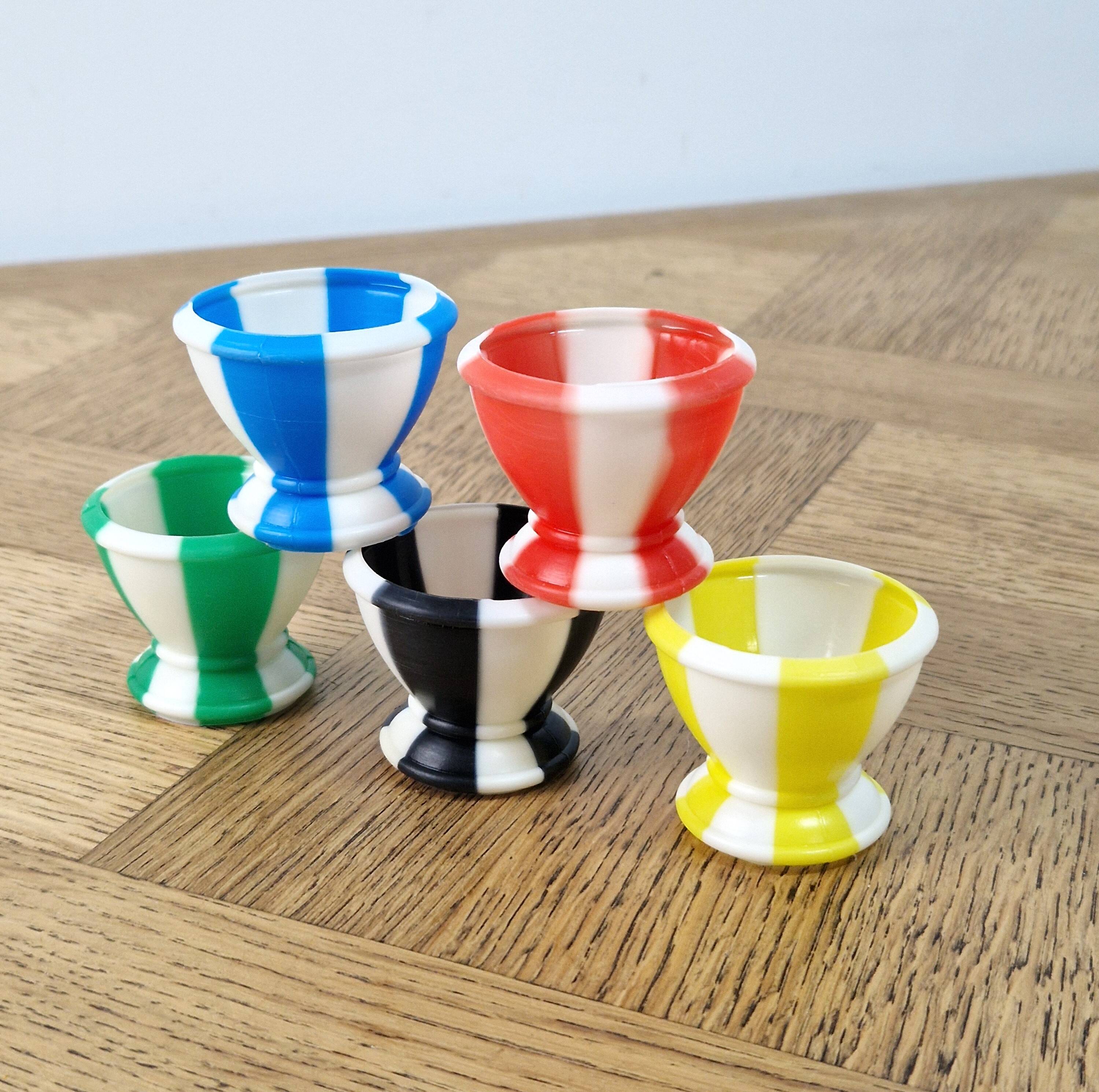 5 egg cups in the shape of a diabolo from the 60s/70s.