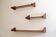 Minimalist mahogany shelves from the 1960s.