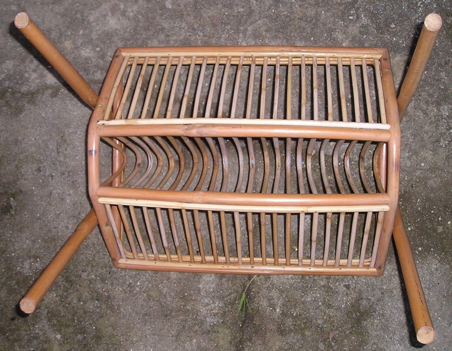 Magazine rack Wicker rattan of the 1970s vintage