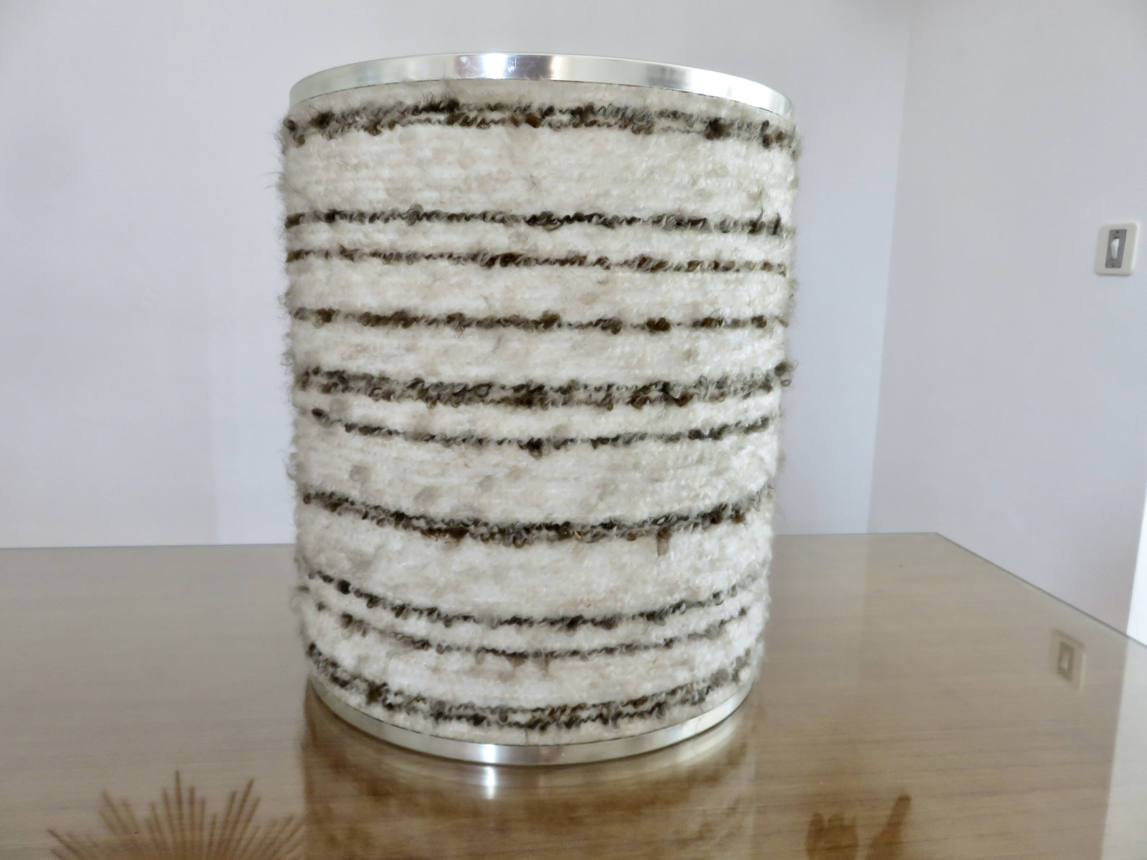 Brushed aluminum and chrome lamp typical of the 70s