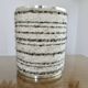 Brushed aluminum and chrome lamp typical of the 70s