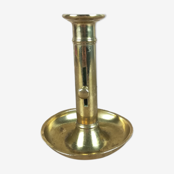 Brass pusher candle holder