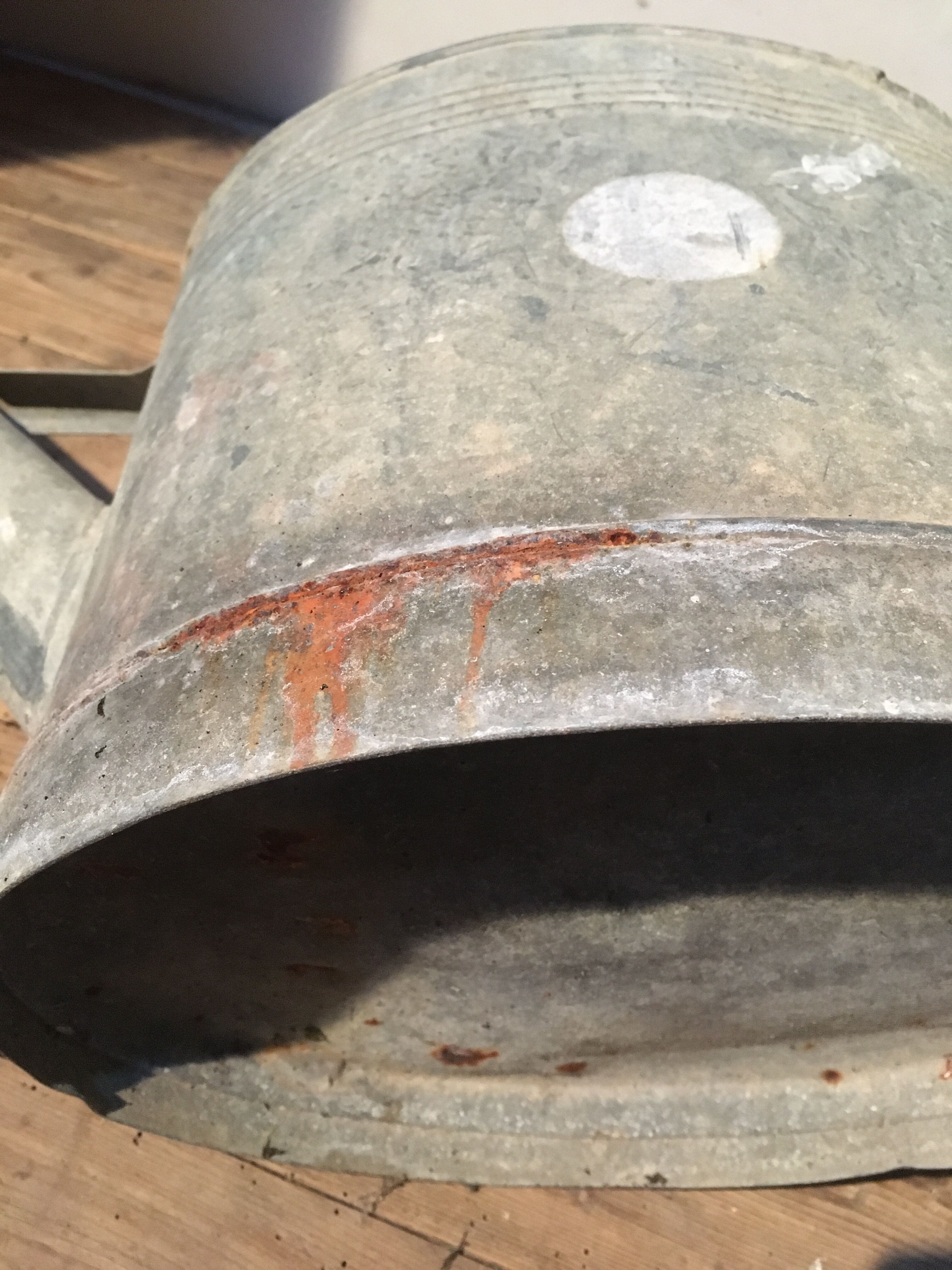 Zinc and copper apple watering can