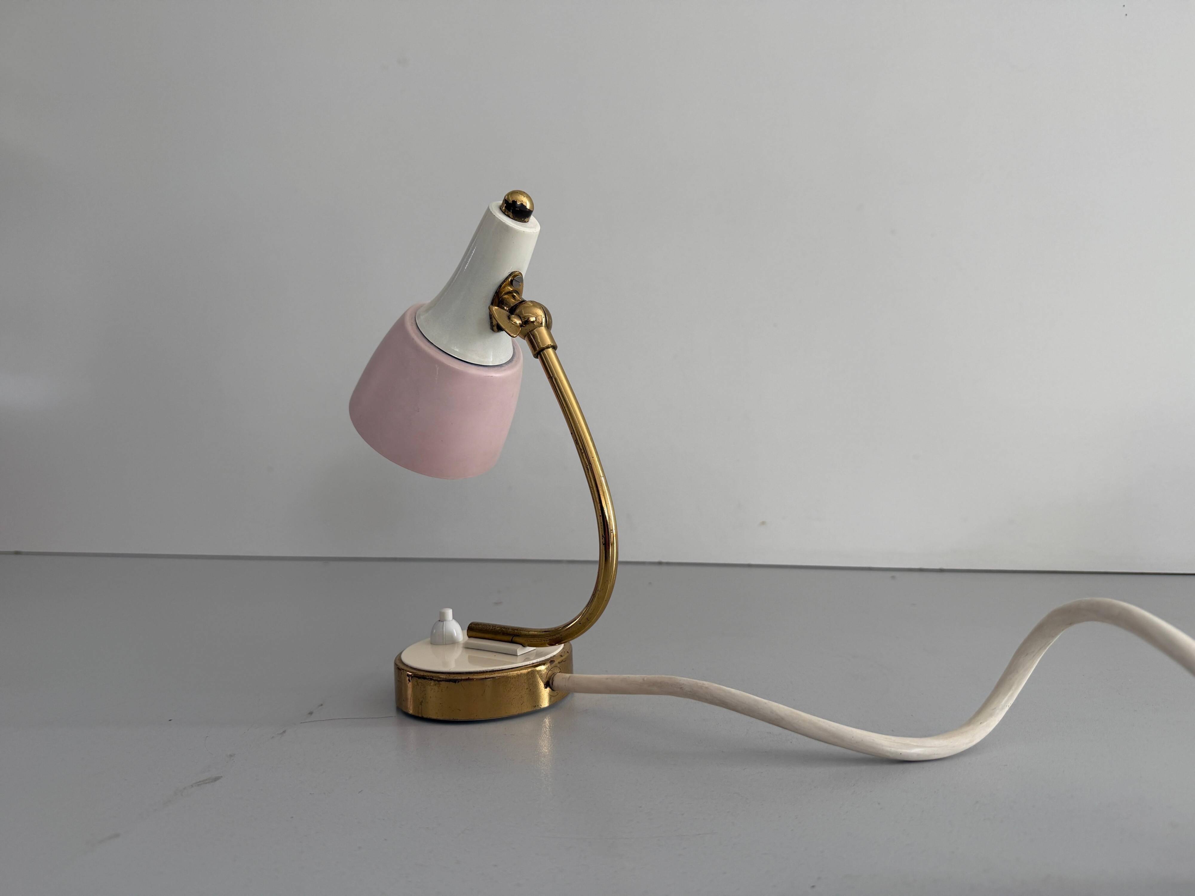 Simple table lamp with a pink metal head and brass body, 1960s, Germany.