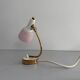 Simple table lamp with a pink metal head and brass body, 1960s, Germany.