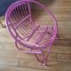 Pink rattan children's armchair