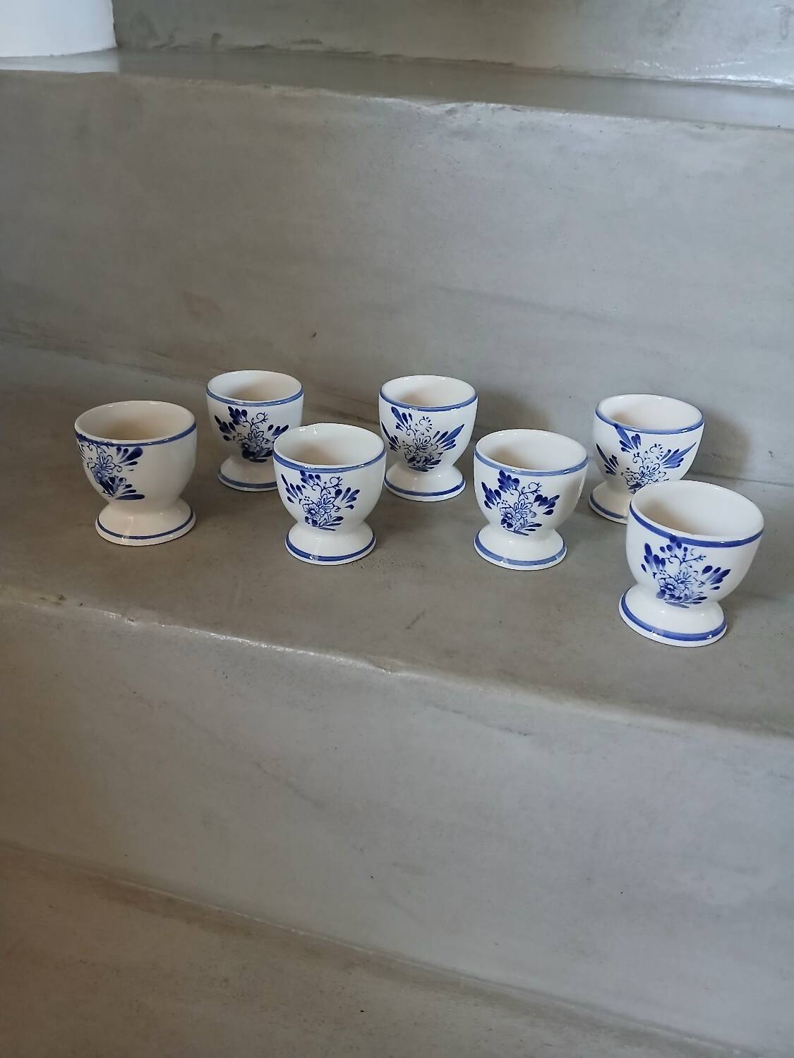 7 antique egg cups