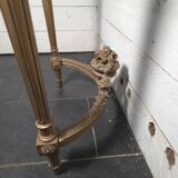 Louis XVI style console in gilded wood with a marble top.