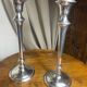 Pair of silver-plated metal candlesticks