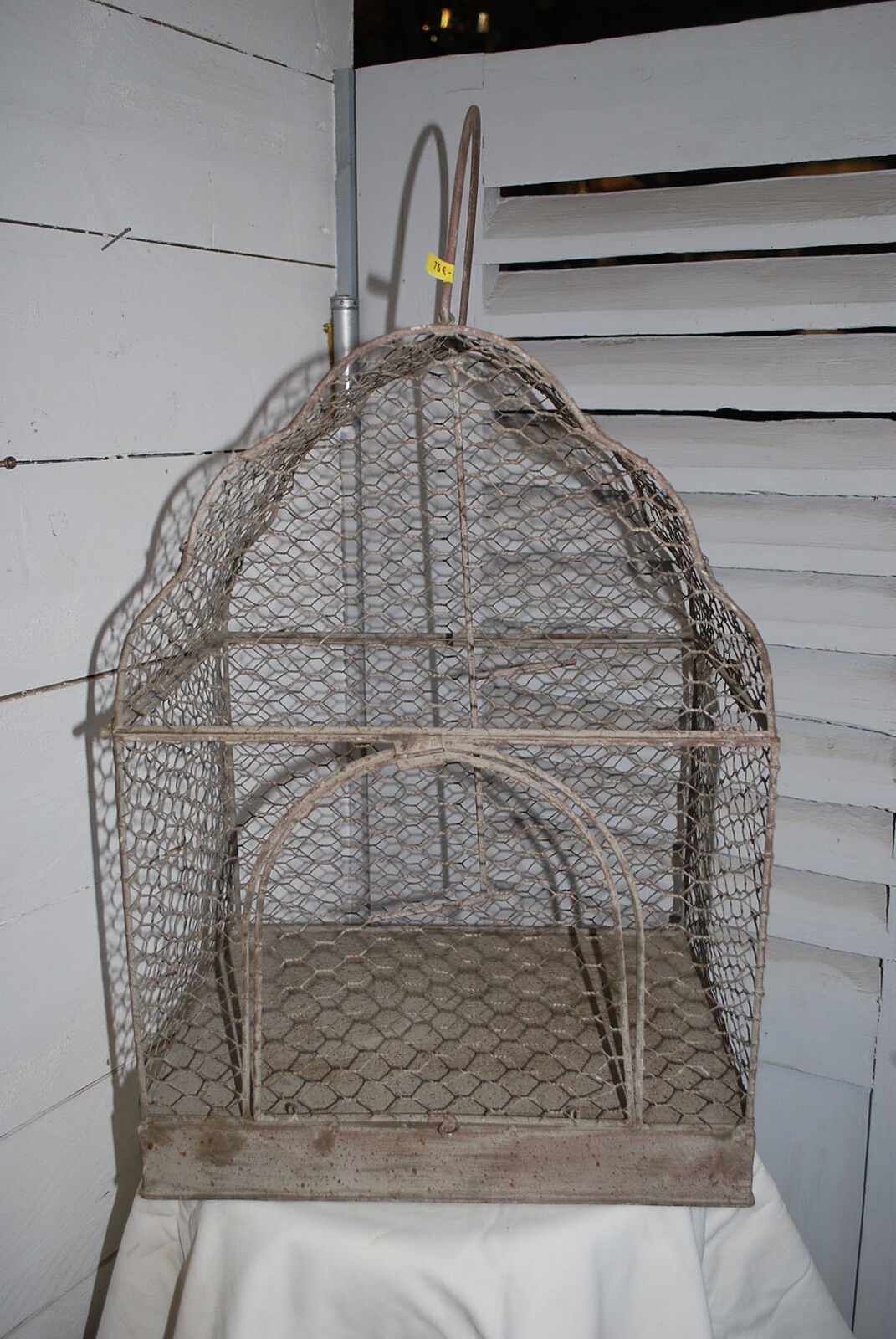 Grey patinated iron cage