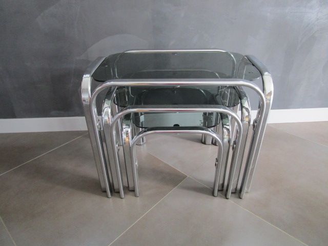 3 Vintage trundle tables in chromed steel and smoked glass