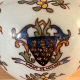 Old vase with floral motif inspired by desvres earthenware
