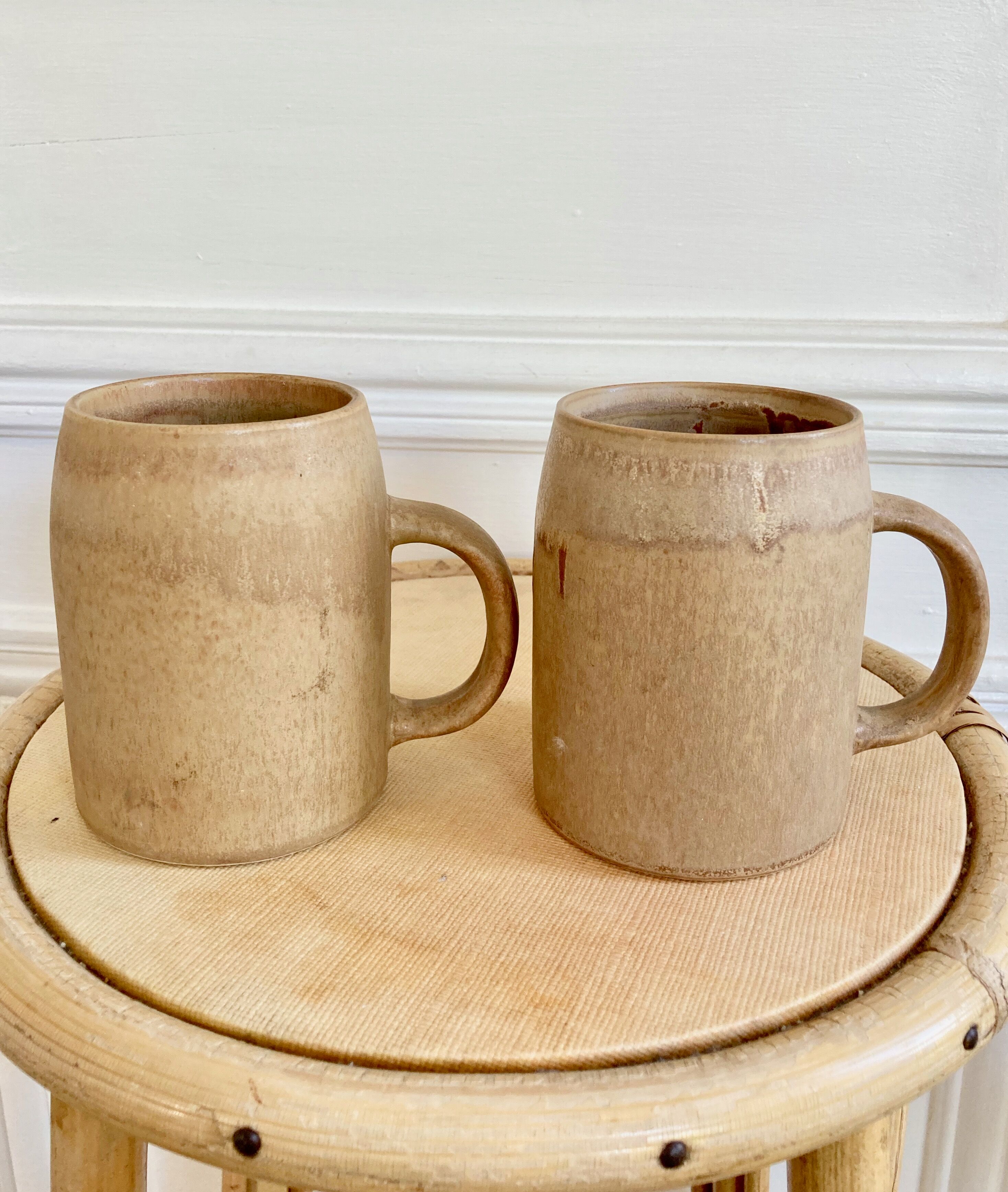 Duo of sandstone mugs