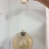 Vintage globe pendant in amber bubble glass