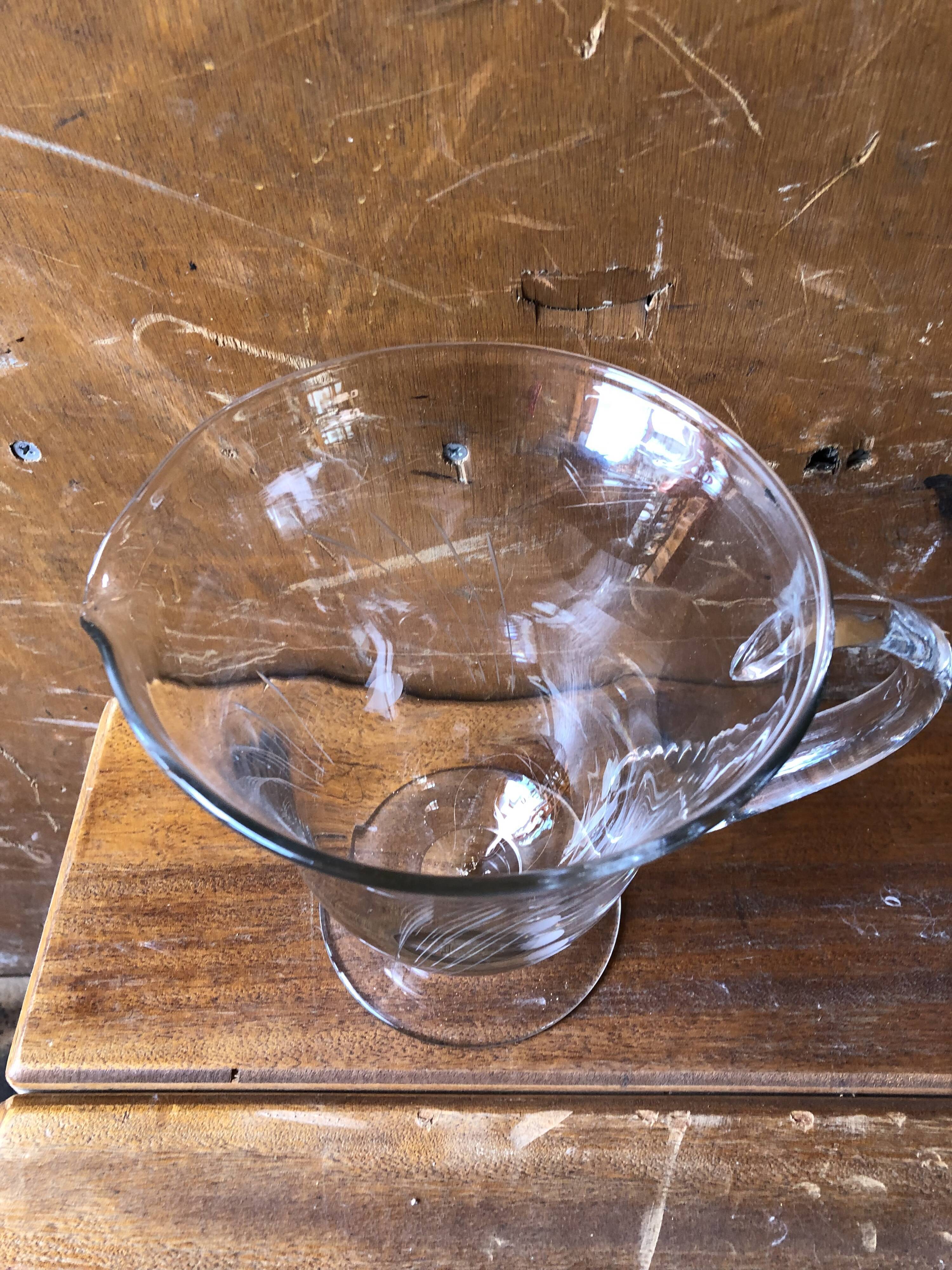 Old pitcher service and 5 foot glasses in engraved glass vintage table art