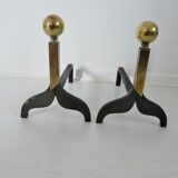 Pair of modernist steel and brass andirons
