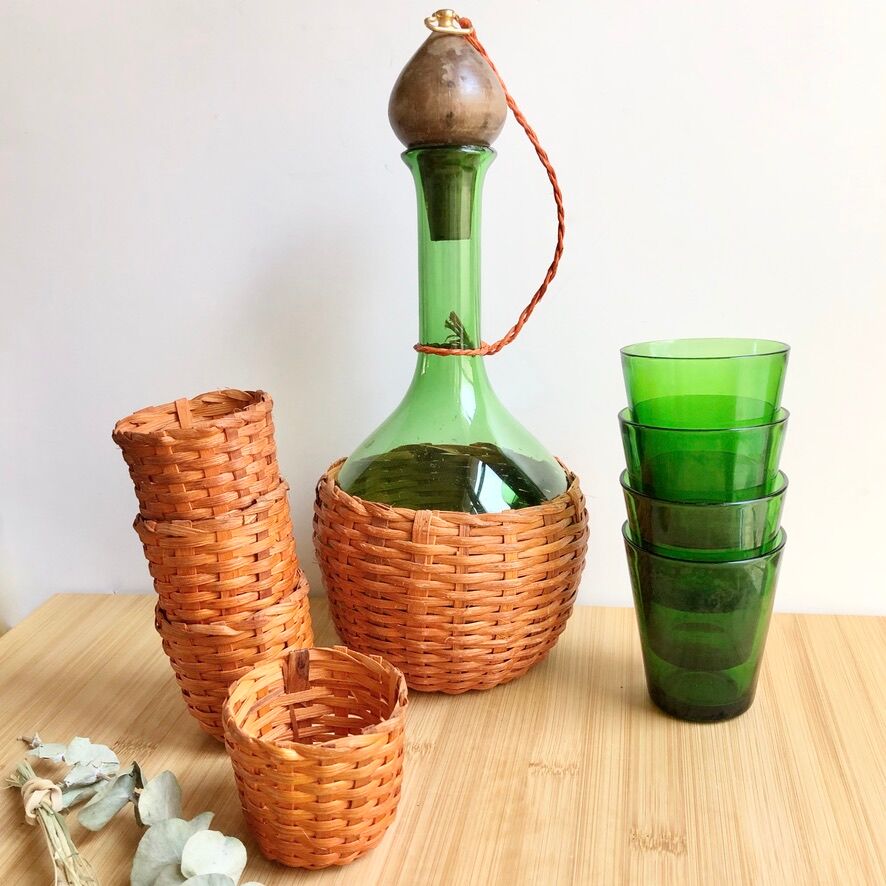 Service carafe and vintage glasses, with wicker