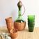 Service carafe and vintage glasses, with wicker