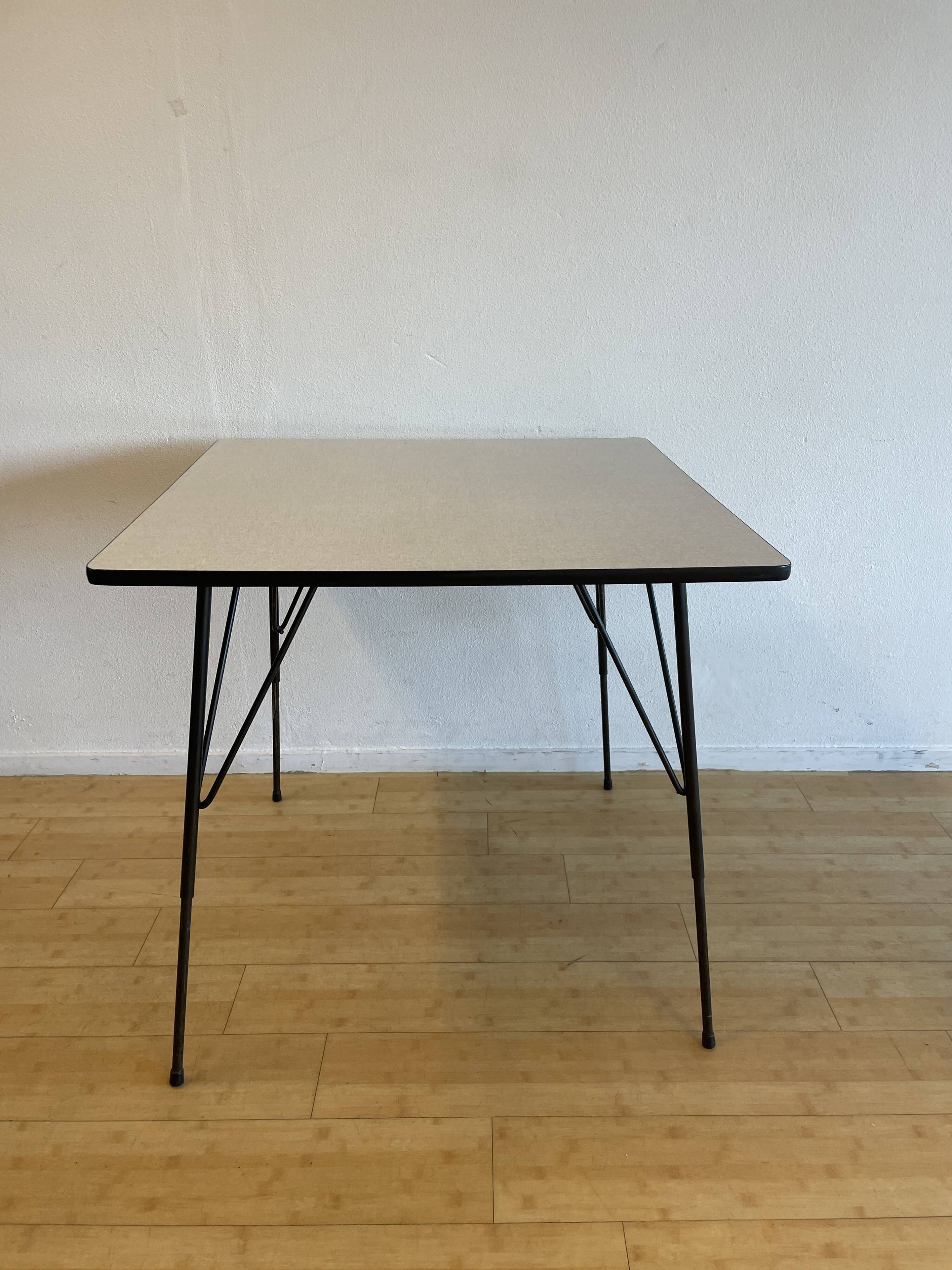 Gray height-adjusted coffee / dining room table, by Rudolf Wolf for Elsrijk