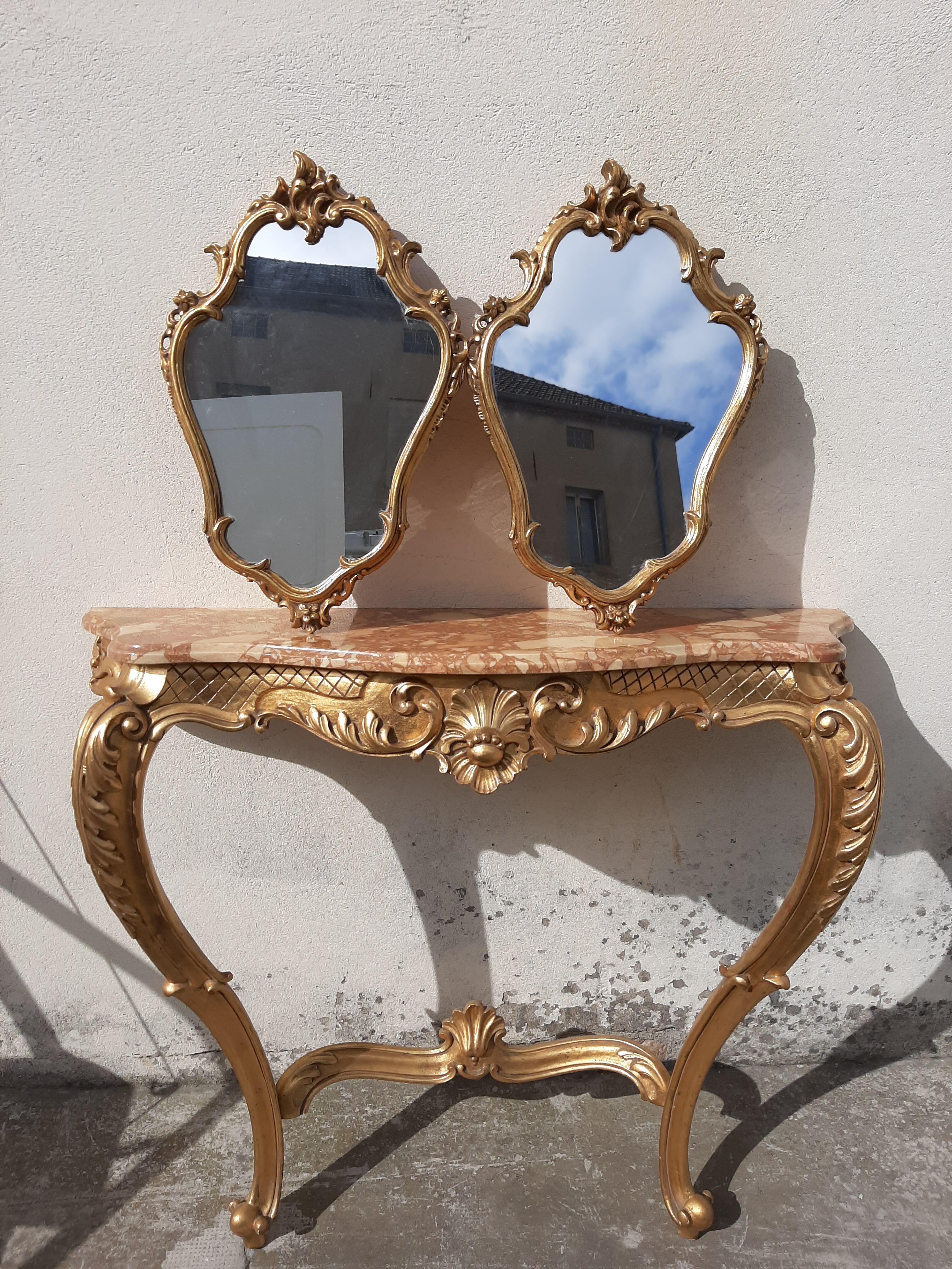 Pair of mirror Baroque style Louis XV gilded