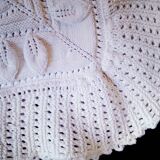 Knitted white cotton bedspread