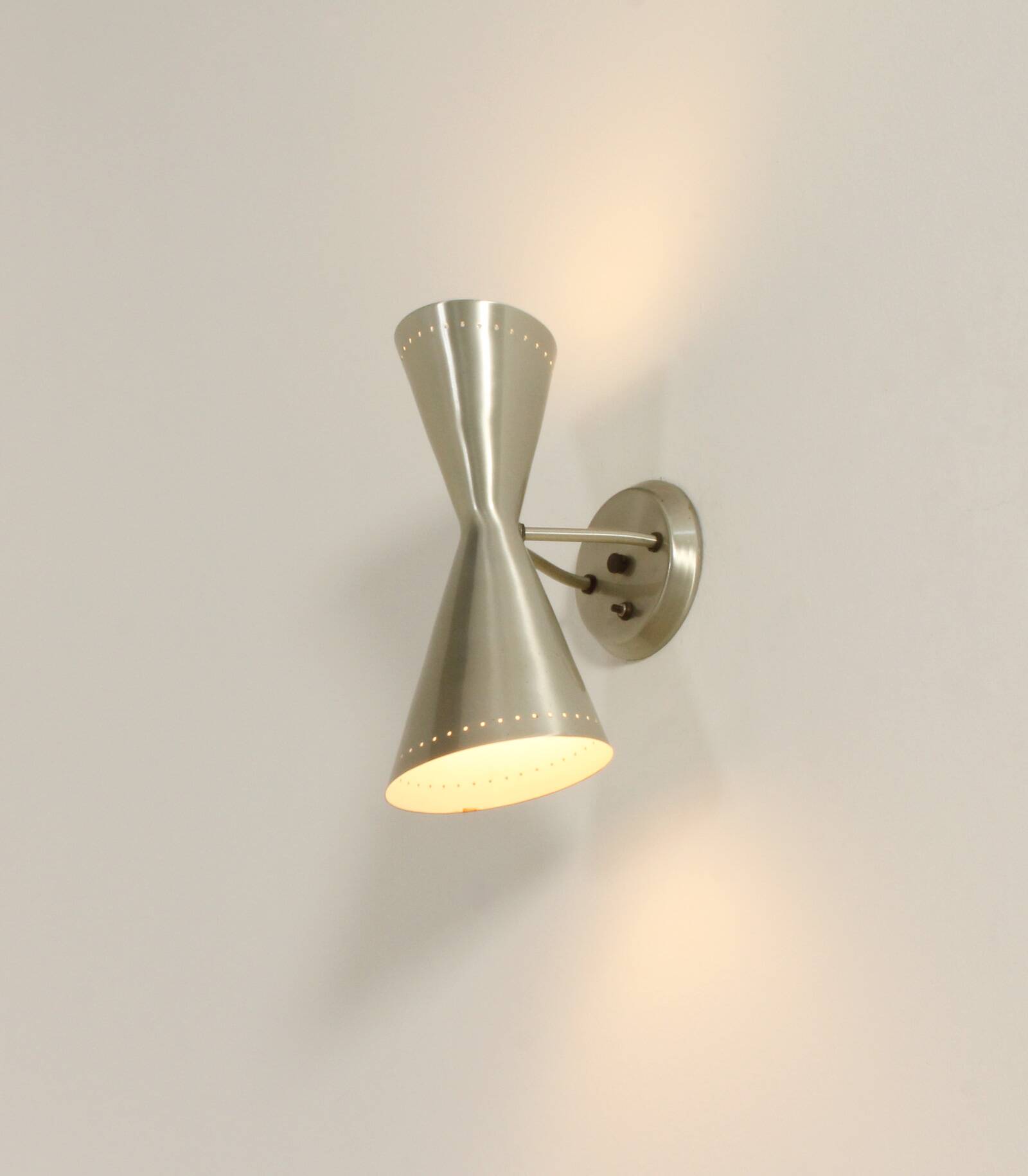 Large diabolo wall light by Litecraft, California, United States, 1950s.