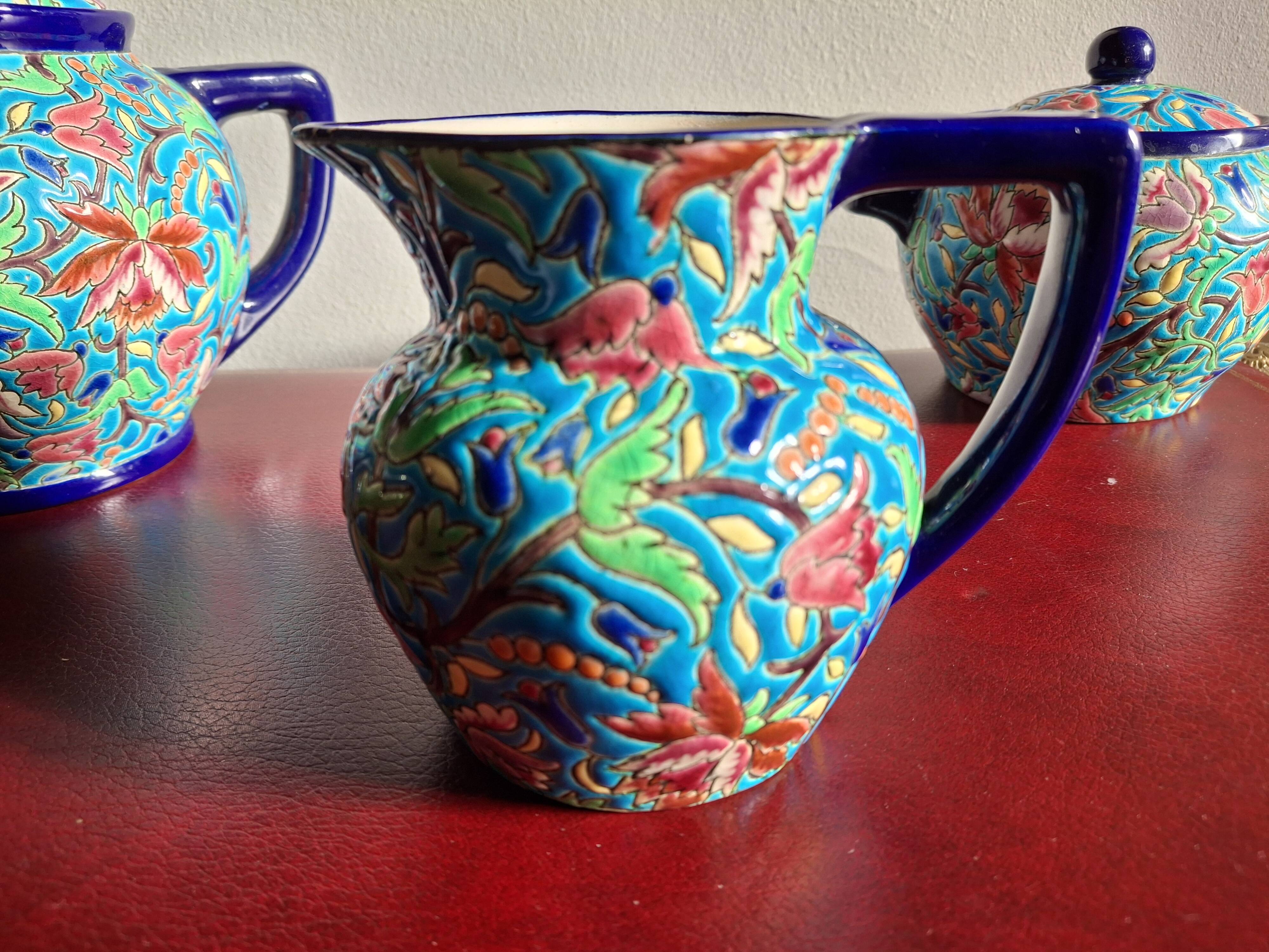 Cloisonné enamel tea service from Longwy in excellent condition.