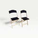 Pair of black and gold folding opera chairs
