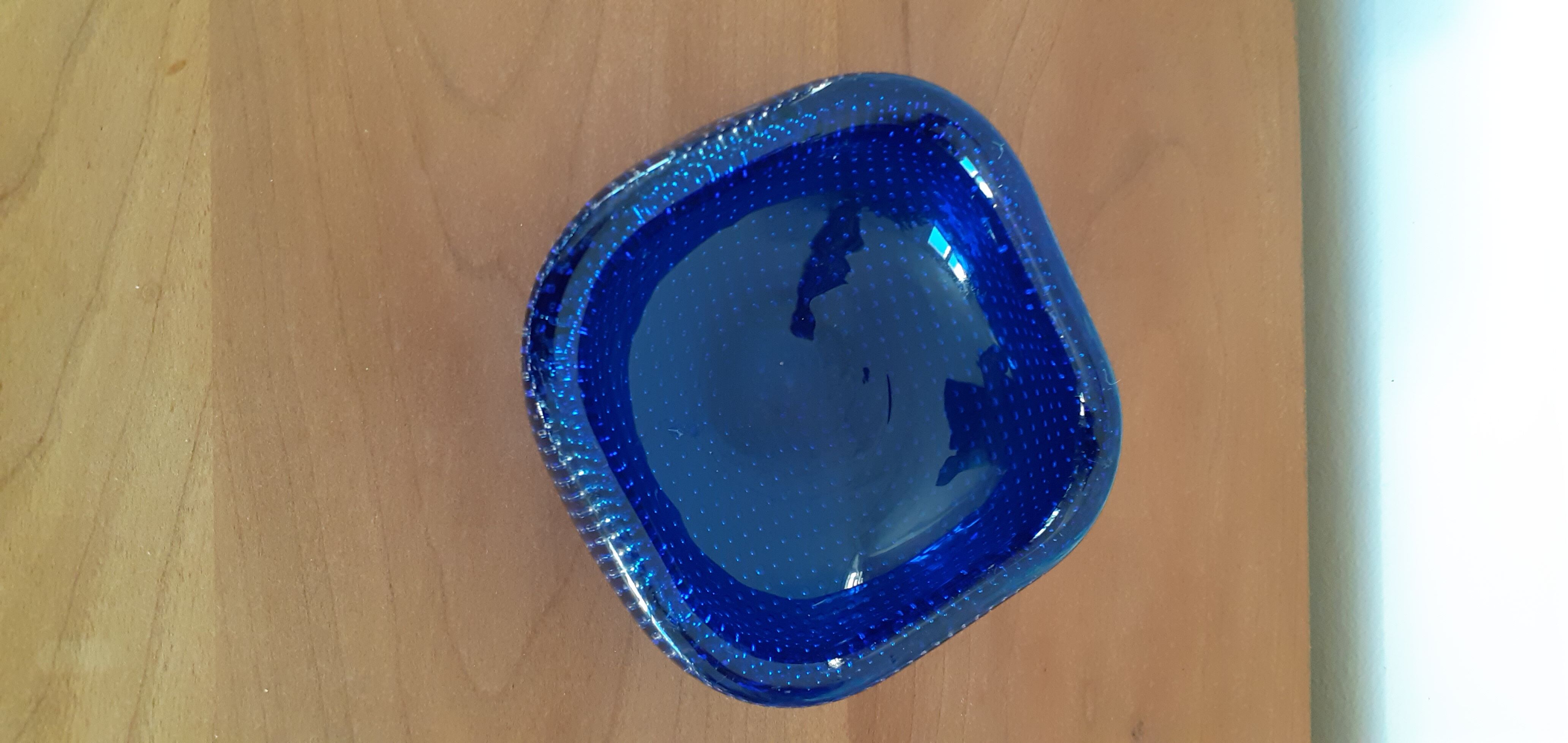 Empty blue bubbled glass pocket