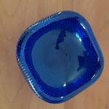 Empty blue bubbled glass pocket