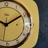 Clock formica vintage silent wall pendulum "Yellow Odo"