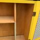 Powdered yellow medicine cabinet