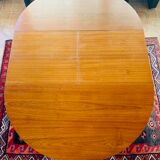 Expandable teak dining table, butterfly extension, circa 60s