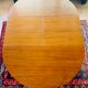 Expandable teak dining table, butterfly extension, circa 60s