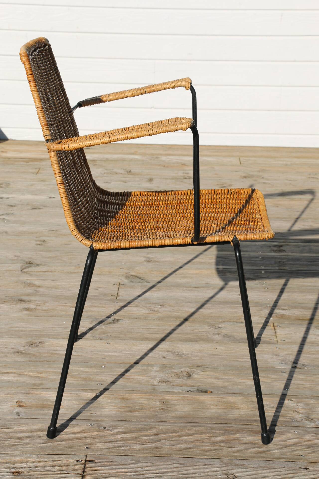 Rattan and steel armchair