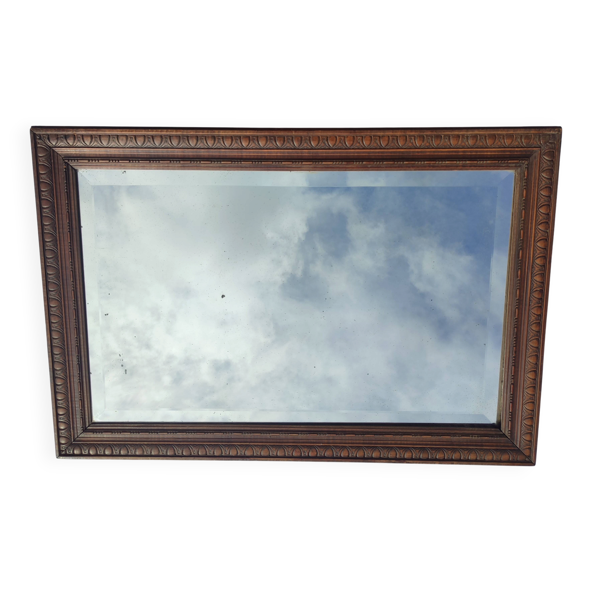 Grand miroir ancien biseauté cadre en bois sculpté