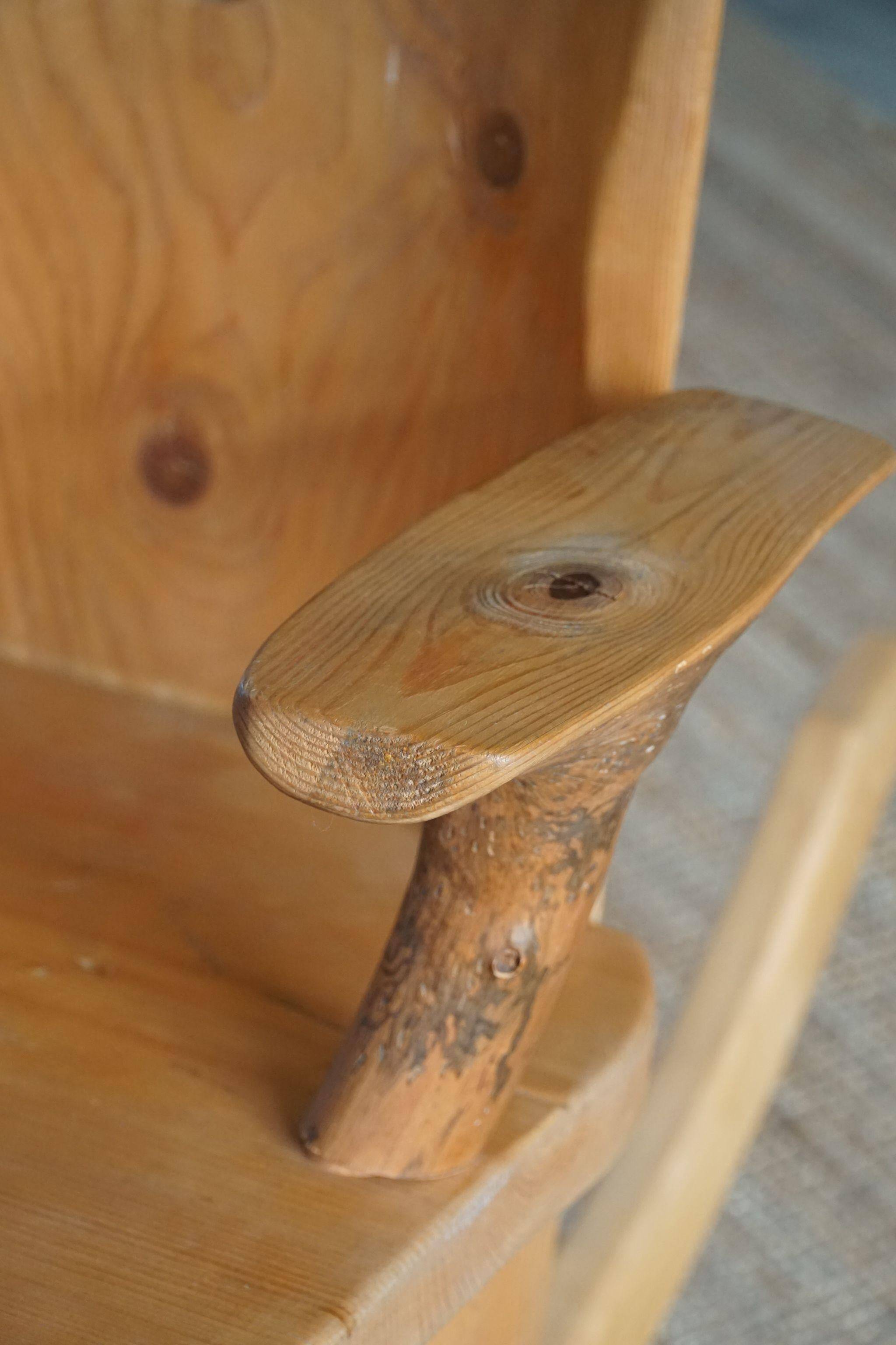 Unique sculptural rocking chair by the Finnish Matti Martikka in solid pine, 1960s.