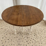 Extendable round table in raw and white wood